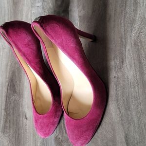 purple high heel shoes